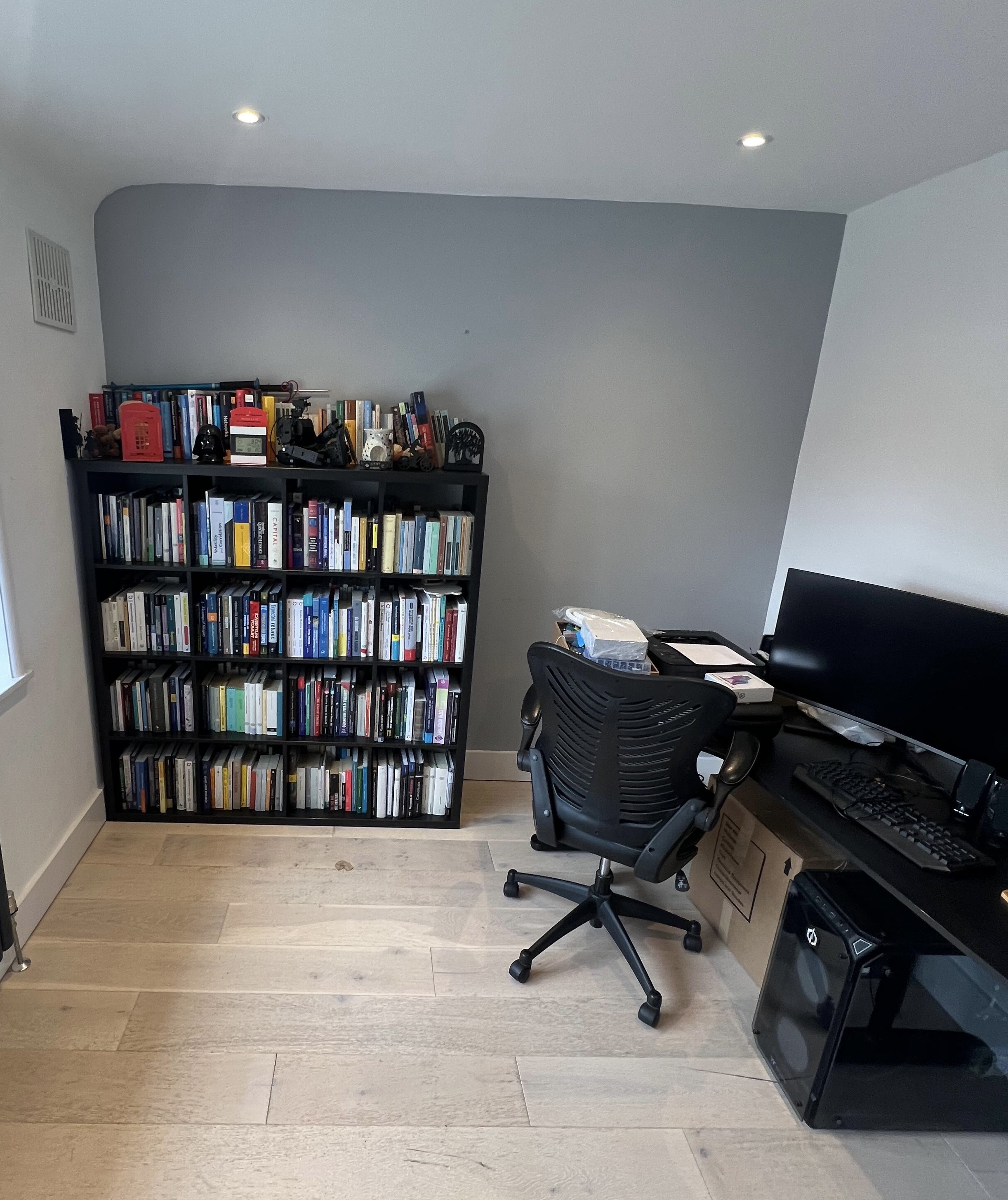 Office removals team handling desks and equipment in Wimbledon