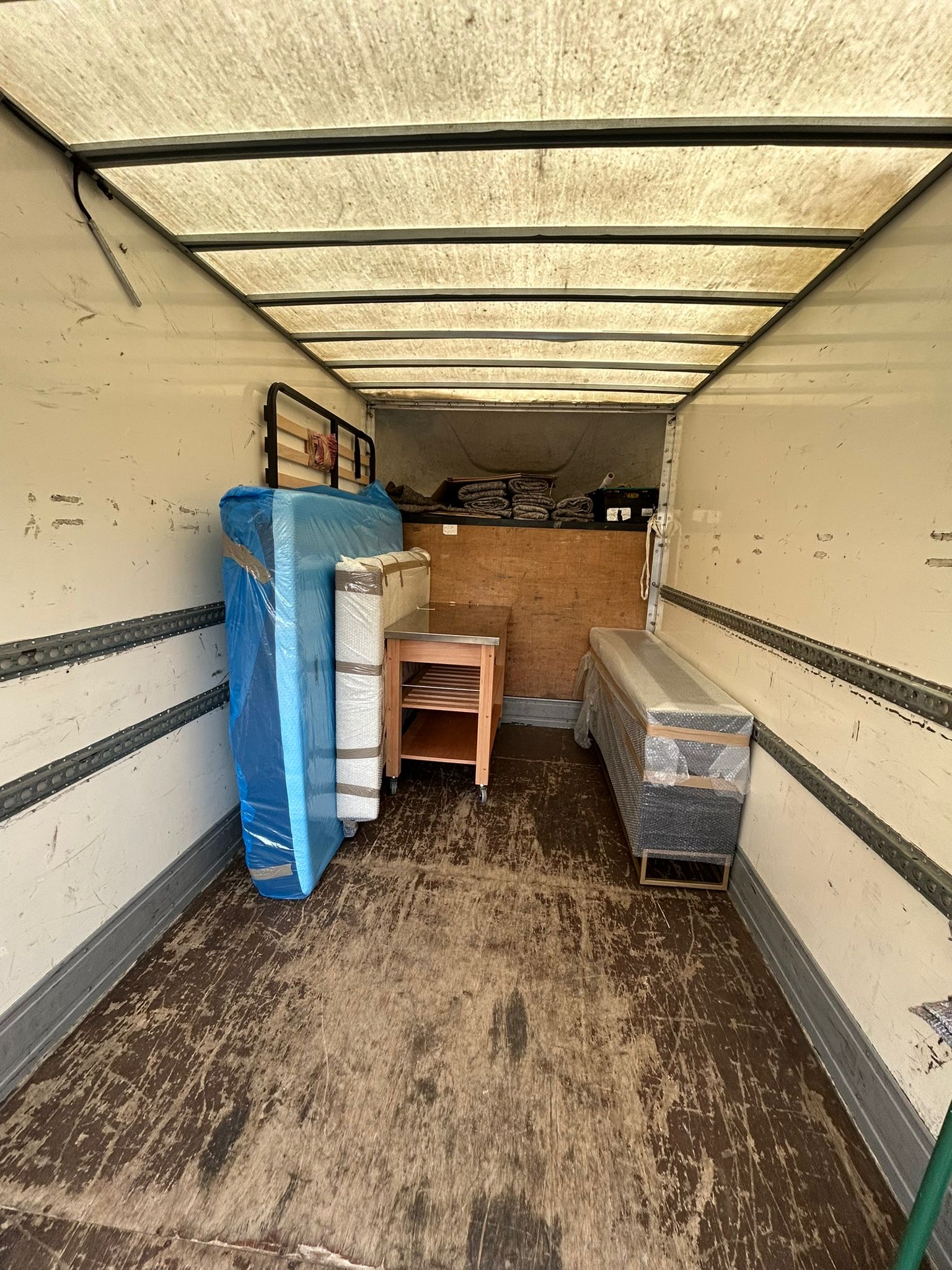 Professional removals van on a residential street in Wandsworth SW18