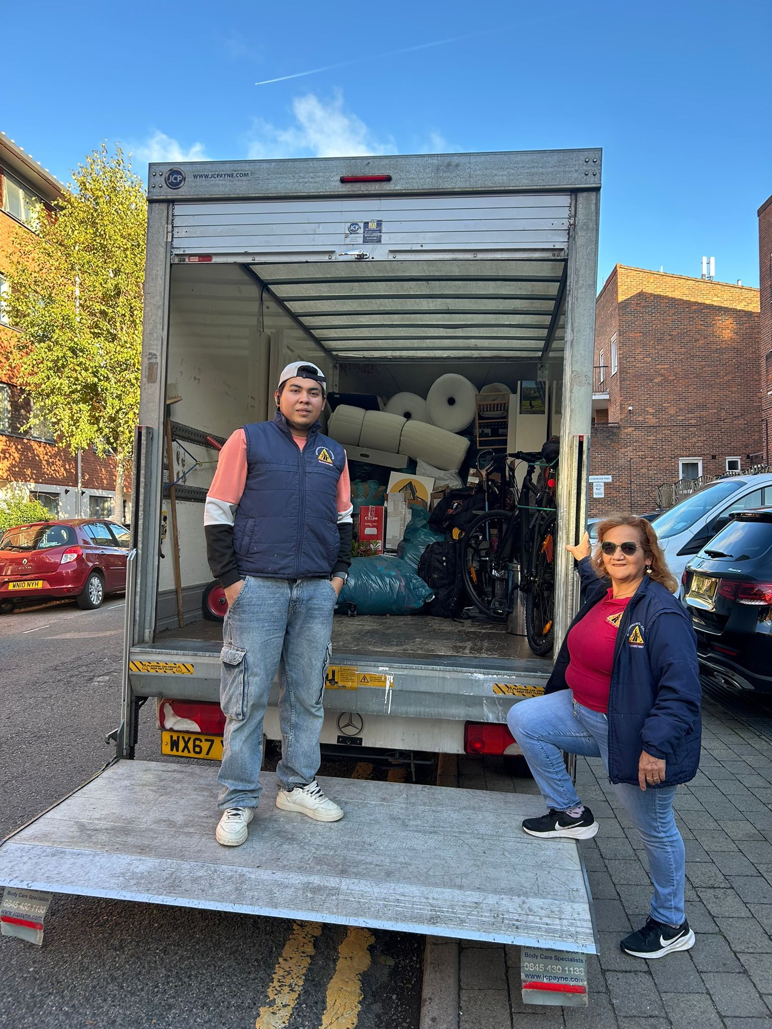 Removals team completing a house move in South West London